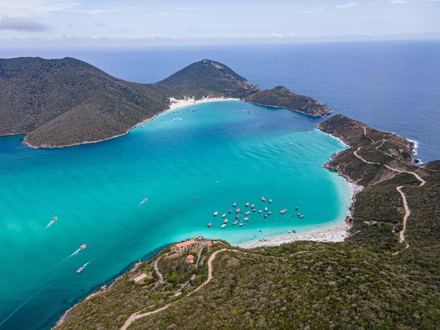 Arraial do Cabo with Boat Trip - Departure from Arraial - Praia do Forno: calm water and coral below the surface