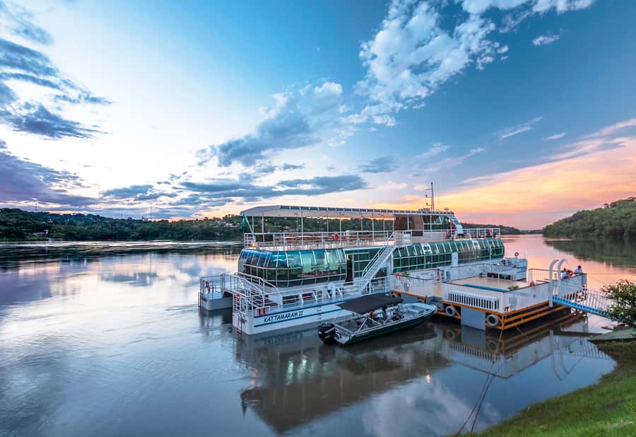 From Foz do Iguaçu: Sunset Catamaran Tour with Meal - Boarding the air-conditioned Kattamaram II