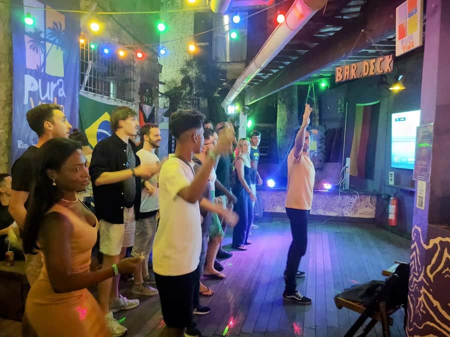 Latin Music Dance Class + DJs + 2 Free Drinks - Arriving at Pura Vida Hostel in Saint Roman Street